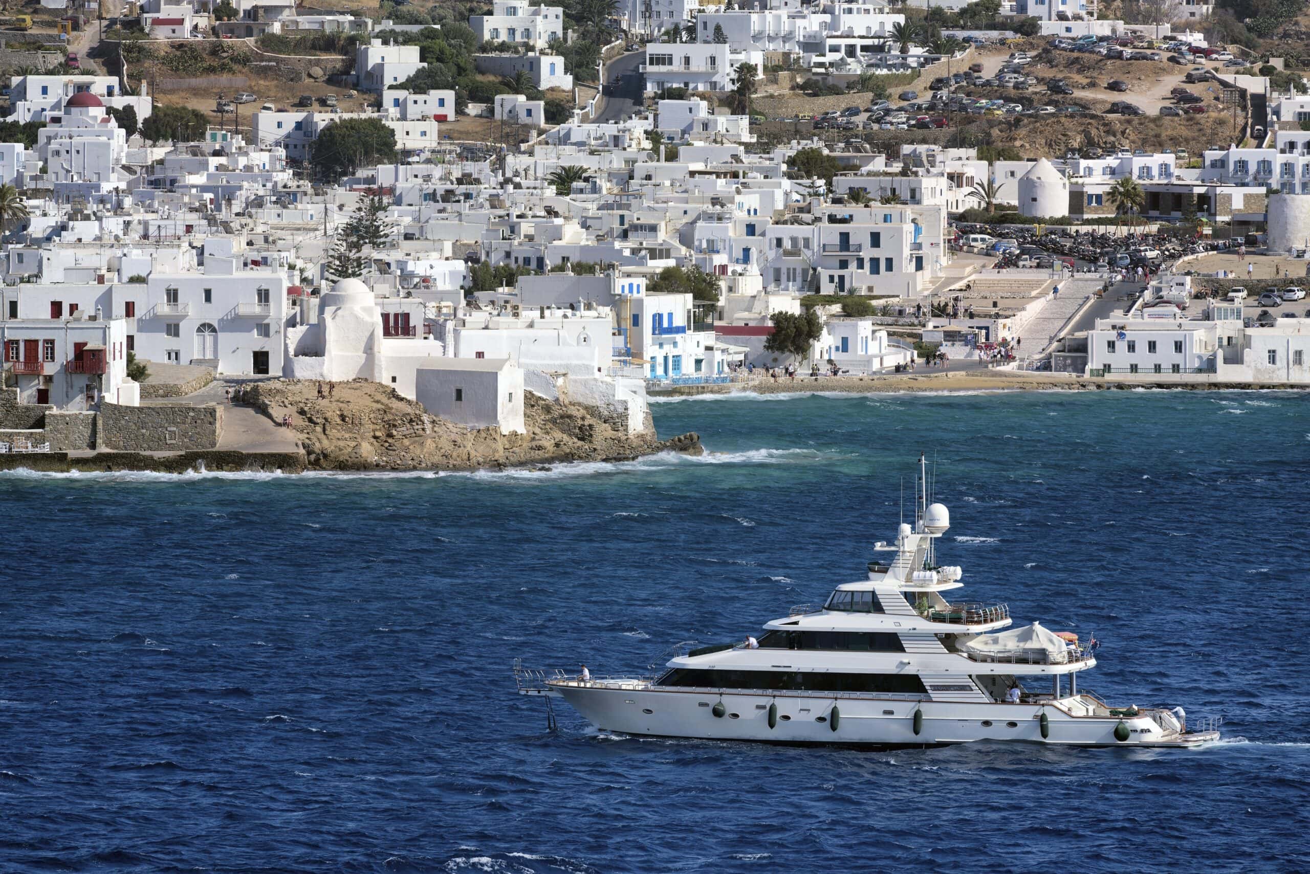 Super-yacht sailing off Greek coastline - rawpixel.com
